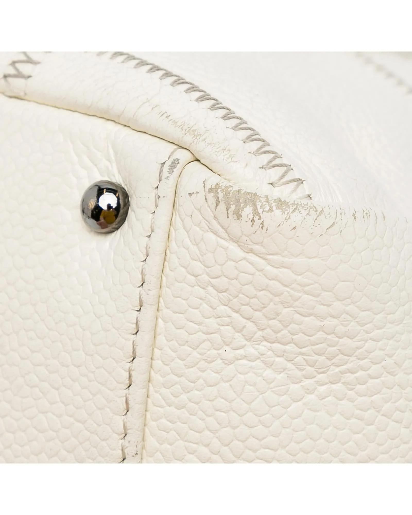 Quilted Leather Shoulder Bag with Top Zip Closure